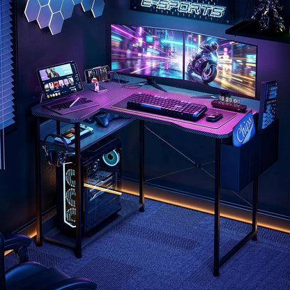 L Shaped Gaming Desk 48 Inch - Computer Corner Desk with Power Outlets, Reversible Shelves & Storage Bag for Home Office, PC Gaming Table, Black Carbon